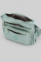 Intérieur du sac Lara d'après la photo du marchand, fond gris uniforme