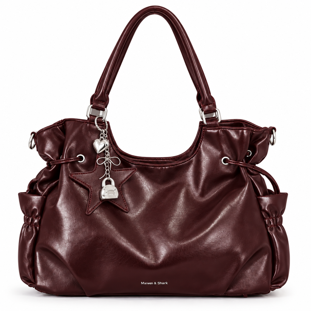 Sac bordeaux avec étoile sur fond blanc