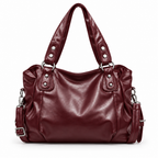 Sac bordeaux sur fond blanc