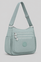 Sac Lara bleu vu de côté sur fond gris