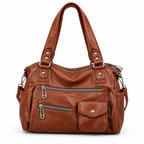 Sac marron cognac multi-poches sur fond blanc
